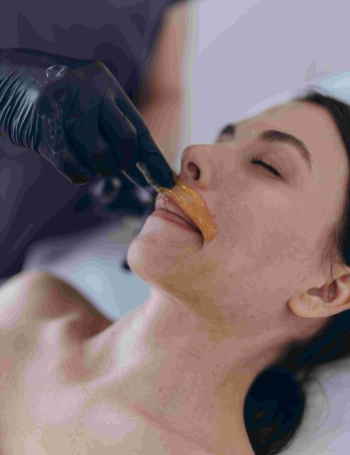 removing-hair-above-upper-lip-of-young-woman-in-sa-2025-07-01-03-54-21-utc